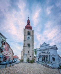 Ptuj (Pettau), St. George Parrish Church bell tower and the City Theatre, Slovenian Styria, Slovenia Ptuj (Pettau), St. George Parrish Church bell tower and the City Theatre, Slovenian Styria, Slovenia